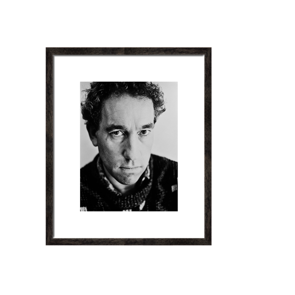 png black framed ,black and white photograph of Simon Callow .Actor ,photograph by Bo Lutoslawski