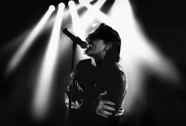 a black and white photograph for sale of singer Bono